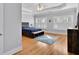 Serene main bedroom with tray ceilings, plantation shutters, and a blue accent rug at 1690 Mosaic Way, Smyrna, GA 30080