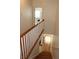 Staircase with a white and wood banister, and hardwood floors at 1690 Mosaic Way, Smyrna, GA 30080