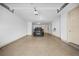 Spacious garage with car parked inside at 2102 Monhegan Se Way # 2102, Smyrna, GA 30080