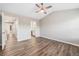 Spacious bedroom featuring high ceiling, light grey walls, and wood-look flooring at 1331 Penhurst Dr, Lawrenceville, GA 30043