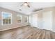 Bedroom featuring neutral walls, wood look flooring, and natural light at 1331 Penhurst Dr, Lawrenceville, GA 30043