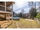 Large backyard featuring a screened porch, above ground pool, basketball court and privacy fence at 134 Turman Se Ave, Atlanta, GA 30315