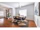 Bright dining room featuring hardwood floors, neutral colors, stylish furniture, and modern decor at 134 Turman Se Ave, Atlanta, GA 30315