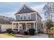 Charming two-story home featuring a covered front porch and well-maintained landscaping, ideal for suburban living at 134 Turman Se Ave, Atlanta, GA 30315