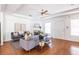 Bright living room featuring a fireplace, hardwood floors, and comfortable seating, creating a welcoming space at 134 Turman Se Ave, Atlanta, GA 30315