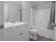 Bright bathroom featuring a tub/shower and updated vanity at 2124 Mitford Ct, Dacula, GA 30019