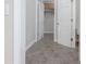 Hallway leading to a bedroom and bathroom at 2124 Mitford Ct, Dacula, GA 30019