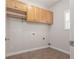 Laundry room with built in storage at 2124 Mitford Ct, Dacula, GA 30019