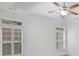 Bedroom featuring a ceiling fan and two windows at 2752 Middlecreek Way, Cumming, GA 30041