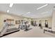 Well-equipped gym featuring modern exercise equipment and ample natural light at 2752 Middlecreek Way, Cumming, GA 30041