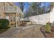 Backyard featuring a patio, walkway and lots of trees for privacy at 891 Legacy Woods Dr, Norcross, GA 30093