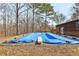 Backyard inground pool with cover, diving board and pool house at 4009 Highway 138 Sw, Stockbridge, GA 30281