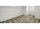Well-lit closet space with wire shelving and neutral carpeting, ideal for organization at 1734 Doonbeg Ct, Kennesaw, GA 30152