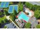 Aerial view of community amenities including pool, tennis courts, and clubhouse at 1734 Doonbeg Ct, Kennesaw, GA 30152
