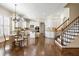 Spacious kitchen featuring custom cabinets, stainless steel appliances, and hardwood floors at 1734 Doonbeg Ct, Kennesaw, GA 30152