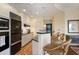 Modern kitchen featuring built-in appliances, a breakfast bar, and contemporary design at 2828 Peachtree Nw Rd # 903, Atlanta, GA 30305