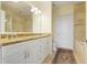 Bathroom featuring double sinks, granite countertops, and a separate tub and shower at 2828 Peachtree Nw Rd # 903, Atlanta, GA 30305