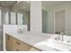 Bathroom with dual sinks, quartz countertops, and modern fixtures at 2425 Peachtree Ne Rd # 1604, Atlanta, GA 30305