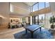 Enjoy a game of pool or lounge in the inviting common area with high ceilings and ample seating at 2425 Peachtree Ne Rd # 1604, Atlanta, GA 30305