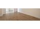 Bright room features newly installed hardwood flooring, baseboards, and neutral colors at 2425 Peachtree Ne Rd # 1604, Atlanta, GA 30305