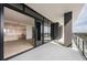 Condo features sliding glass doors that lead to a bright, modern living space with an open kitchen at 2425 Peachtree Ne Rd # 1604, Atlanta, GA 30305