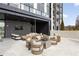 Relaxing outdoor patio area with comfortable seating and a cozy fire pit. Perfect for entertaining at 2425 Peachtree Ne Rd # 1604, Atlanta, GA 30305