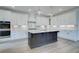 Elegant kitchen with white cabinets, stainless steel appliances, and a center island at 2714 Byess Ct, Marietta, GA 30064