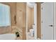 Bathroom featuring a soaking tub and tile flooring, with views to a toilet and closet at 4668 Raiders Ridge Ct, Lithonia, GA 30038