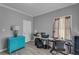 Bedroom featuring modern gray walls and hardwood floors at 4668 Raiders Ridge Ct, Lithonia, GA 30038