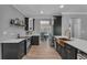 Kitchen boasts modern stainless steel appliances and white countertops at 4668 Raiders Ridge Ct, Lithonia, GA 30038