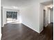 Inviting living room with hardwood floors, a sliding door, and recessed lighting at 4673 Hairston Crossing Way, Stone Mountain, GA 30083