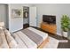 Well-lit bedroom featuring closet, wood-look flooring, with complementary decor at 4673 Hairston Crossing Way, Stone Mountain, GA 30083