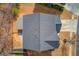 A charming home from an aerial view with a deck, patio, driveway and well maintained roof at 1169 Harvest Brook Dr, Lawrenceville, GA 30043