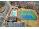 Aerial view of pool and tennis courts, offering a community-centric lifestyle at 1169 Harvest Brook Dr, Lawrenceville, GA 30043