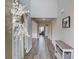 Bright foyer featuring tall ceilings, wood floors, and a view into the adjacent living spaces at 1169 Harvest Brook Dr, Lawrenceville, GA 30043