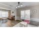 Spacious, sunlit living room with a neutral palette, offering versatile spaces for entertaining and relaxation at 1169 Harvest Brook Dr, Lawrenceville, GA 30043