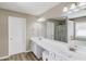 Large bathroom with double vanity, separate shower, and soaking tub at 1169 Harvest Brook Dr, Lawrenceville, GA 30043