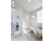 Luxurious bathroom with double vanity, soaking tub, and glass-enclosed shower at 2140 Parkside Ln, Roswell, GA 30076