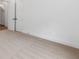 Bedroom with neutral carpeting, white walls, and a double door closet at 2140 Parkside Ln, Roswell, GA 30076