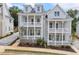 Charming two-story home with a double front porch and beautiful exterior paint at 2140 Parkside Ln, Roswell, GA 30076