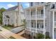 Charming two-story home with a double front porch and lovely exterior finishes at 2140 Parkside Ln, Roswell, GA 30076