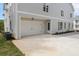 Attached two car garage with extended driveway and well maintained lawn at 2140 Parkside Ln, Roswell, GA 30076