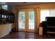 Basement area with glass paneled doors and natural lighting at 3938 Landress Way, Lawrenceville, GA 30044