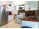 Well-equipped kitchen featuring stainless steel refrigerator and ample countertop space at 3938 Landress Way, Lawrenceville, GA 30044