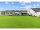Expansive backyard with lush green grass, perfect for outdoor activities and relaxation at 2040 Ripple Park Bnd, Canton, GA 30114