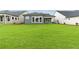 Expansive backyard with lush green grass, perfect for outdoor activities and relaxation at 2040 Ripple Park Bnd, Canton, GA 30114