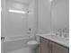 Modern bathroom featuring a shower-tub combo, sleek vanity, and contemporary fixtures at 2040 Ripple Park Bnd, Canton, GA 30114
