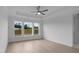 Bright bedroom with large windows providing ample natural light and pleasant views at 2040 Ripple Park Bnd, Canton, GA 30114