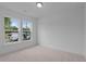 Cozy bedroom with carpet flooring, ample natural light, and minimalist design at 2040 Ripple Park Bnd, Canton, GA 30114