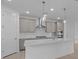 Bright kitchen featuring an island, stainless steel appliances, and white subway tile backsplash at 2040 Ripple Park Bnd, Canton, GA 30114